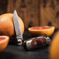 Klappmesser Optima Maserbirke Bloody Orange Damast, Böker