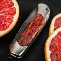 Klappmesser Optima Maserbirke Bloody Orange Damast, Böker